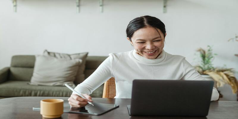 A person using a stylus and a computer AI-generated content may be incorrect.